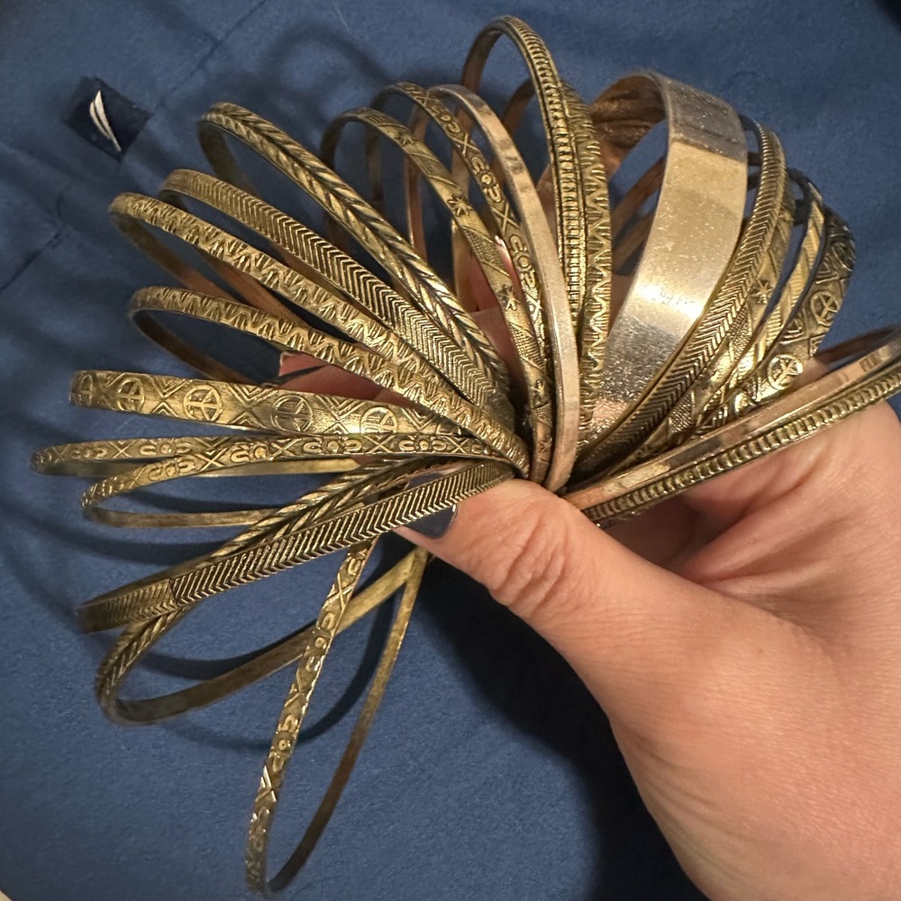 22 Large antique bronze bangles
